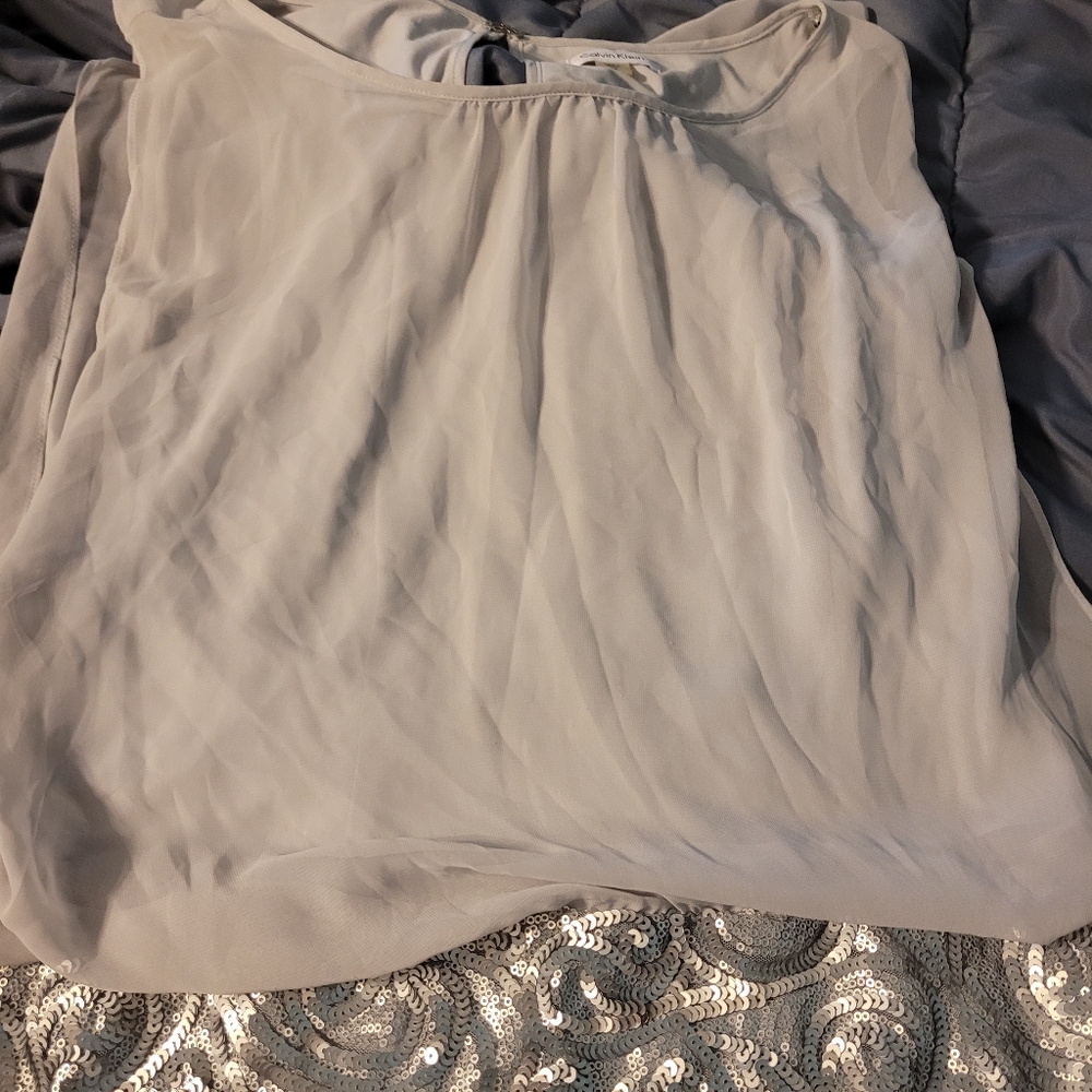 Grey and silver with sequins. Calvin Klein size 10 dress with keyhole back.
